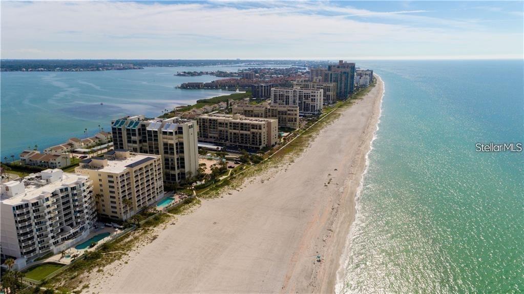 IMMEDIATE AVAILABILITY FOR 3 - 9 MONTH LEASE -FULLY FURNISHED-HIGHLY DESIRED CORNER BEACH CONDO WITH 2 BALCONIES-TROPICAL BEACH PARADISE-LIGHT AND BRIGHT TURNKEY CONDO IMMEDIATE AVAILABILITY - SPACIOUS 2 BEDROOMS & 2 FULL BATH'S - THE GULF OF MEXICO IS YOUR BACK YARD, STEP DIRECTLY INTO THE SOFT POWDERY SAND- LET THE SUNSHINE AND THE SOUND OF THE GENTLE WAVES REJUVINATE AND RESTORE YOU -THIS BEACH HOME IS VERY COMFORTABLE WITH TROPICAL DECOR & TILE FLOORING THROUGHOUT -COMFORTABLE LEATHER LIVING ROOM FURNITURE- BEAUTIFUL OPEN LIGHT & BRIGHT KITCHEN WITH SOLID SURFACE COUNTERTOPS AND STAINLESS STEEL APPLIANCES - MASTER BEDROOM HAS KING BED AND UPDATED MASTER BATH TUB WITH SHOWER AND NEW DOUBLE SINK VANITY -GUEST BEDROOM HAS QUEEN SIZE BED AND DAYBED WITH 2 TWIN MATTRESSES- GUEST BATHROOM WITH WALK IN SHOWER- CONVENIENT WASHER & DRYER CLOSET IN THE UNIT- YOU WILL LOVE THE EXTRA LARGE BALCONY TO TAKE IN THE BEAUTY OF THE BEACH AND THE GULF OF MEXICO- THIS CORNER UNIT HAS A SECOND JULIET BALCONY- THE CONDO HAS ELECTRIC HURRICANE SHUTTERS MAKE IT EASY TO LEAVE OUTDOOR FURNITURE OUTSIDE AND SIMPLY CLOSE THE HURRICANE SHUTTERS IF GOING OUT OF TOWN WITH JUST A FLIP OF A SWITCH-SHUTTERS COME DOWN- CONDO COMES WITH COVERED PARKING SPACE AND STORAGE BEACH LOCKER #103- SOUTH BEACH II IS A PRIVATE GATED OCEAN FRONT COMMUNITY DIRECTLY ON THE POWDERY SAND OF CLEARWATER BEACH WITH A THERMALLY HEATED POOL ALLOWING YEAR ROUND SWIMMING ENJOYMENT- THERE IS A GYM AND A CLUB ROOM FOR RESIDENTS TO ENJOY- THE CONVENIENT BEACH TROLLEY JUST STEPS OUTSIDE THE GATE WILL TAKE YOU TO TOP RATED RESTAURANTS- SHOPPING AND AMUSEMENTS OF CLEARWATER BEACH- TAMPA INTERNATIONAL AIRPORT AND CLEARWATER AIRPORT ONLY 20 MINUTES -TAMPA AND ST. PETE IN CLOSE PROXIMITY AFFORDING YOU WILL ALWAYS HAVE SOMETHING FUN & INTERESTING TO DO - COME SEE WHY CLEARWATER BEACH IS RATED #1 BEACH IN THE USA! SORRY NO PETS- WATER-SEWER-TRASH-BASIC CABLE & INTERNET INCLUDED IN RENT
