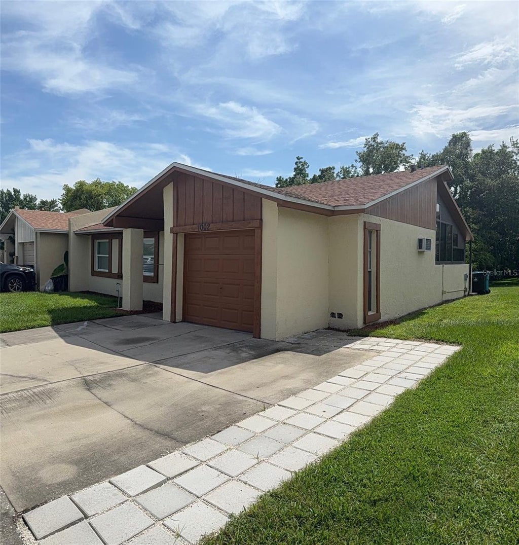 Photo of 1002 Oropesa Avenue, Orlando, FL 32807 (MLS # O6423677)