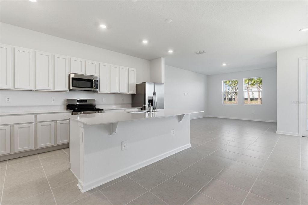 Photo of 2959 Maloof Drive, Davenport, FL 33837 (MLS # O6378957)