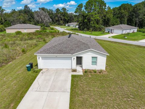 Photo of 241 Live Oak Boulevard, Crescent City, FL 32112 (MLS # OM709726)