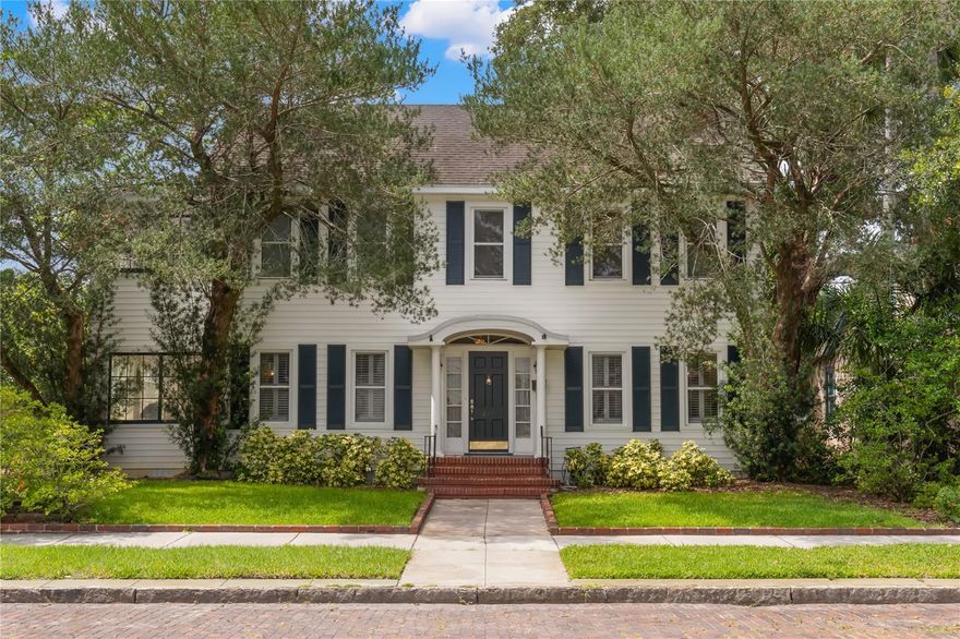 Make this 1920's traditional home your own with over 4,300 square feet of living space, situated on two lots, a rarity in the neighborhood. This sprawling home located in the heart of the prestigious Old Northeast neighborhood is just 4 blocks from the waterfront on a wide brick-lined street.  The second lot is a homeowner’s oasis, accented with mature trees, a lagoon pool with waterfalls, a hot tub and brick pavers accenting the traditional charm of the home. Upon entering the welcoming foyer, you will first notice the beautifully preserved original oak hardwood floors and staircase that opens to the dining room with the original swinging door leading to the kitchen. To the left of the entry sits the formal living room, with fireplace and mantle, that extends to a light and bright sunroom. The sunroom, one of two in the home, is ideal for a reading room, home office, kids’ playroom, or exercise room. Custom wood shutters add elegance to the front of the home in both the dining and living spaces.  There is plenty of space for casual living in the kitchen that includes a breakfast dining space and an expansive peninsula bar opening to the large family room, with additional fireplace, added to the back of the home in 1997. French doors open to the covered lanai leading to the pool, perfect for entertaining. Included during the addition is another large secondary family room with a full bath and downstairs laundry room, making for a large rec room or potential to convert to a downstairs master bedroom or mother-in-law suite.

Upstairs, double doors lead to the spacious primary suite, which boasts two walk-in closets, a large master bath with jetted tub and a separate shower. French doors in the bedroom open to an impressive balcony overlooking the private backyard and a relaxing space for sipping your morning coffee or evening beverage.  Additional upstairs rooms include a second dedicated laundry room, two bedrooms sharing another enclosed sunroom, a full hall bath and a third bedroom that has an ensuite bath and loft for all your storage needs. Plenty of parking in the attached two car garage or on the parking pad with alley access. The owners have a buildable lot letter should someone prefer to build a new home on two lots or subdivide and build two homes. Schedule a private showing today to learn more about the many potentials this home and property have to offer and start living the Florida lifestyle in the most sought after neighborhood in St. Pete, with an easy stroll to the waterfront and the vibrant downtown!
