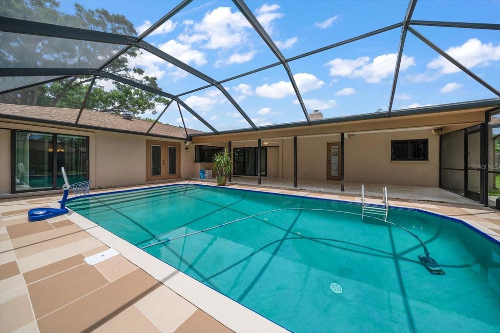 Photo of 1623 El Tair Trl, Clearwater, FL 33765 (MLS # TB8404127)