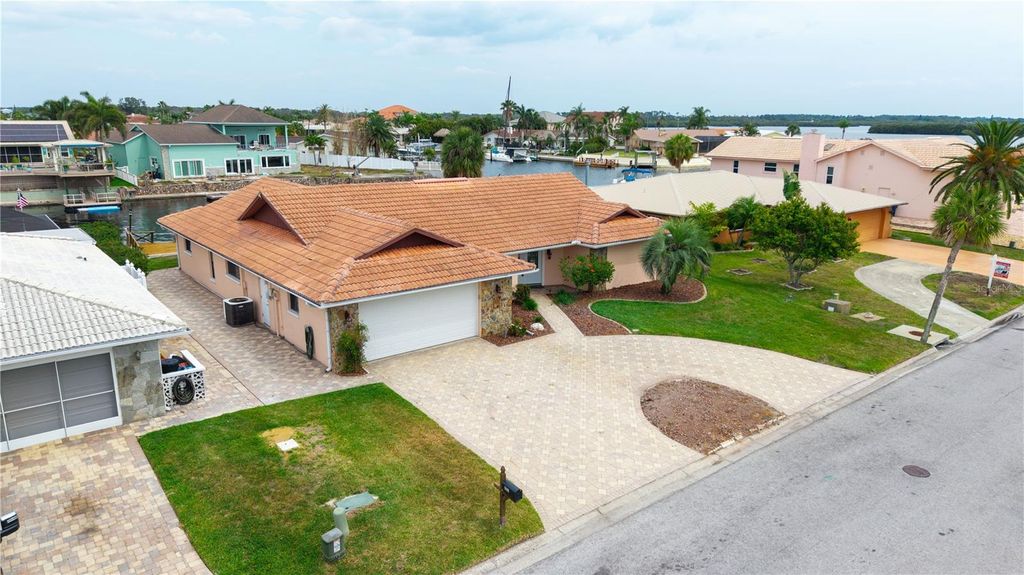 Photo of 5008 Southshore Drive, New Port Richey, FL 34652 (MLS # TB8381959)
