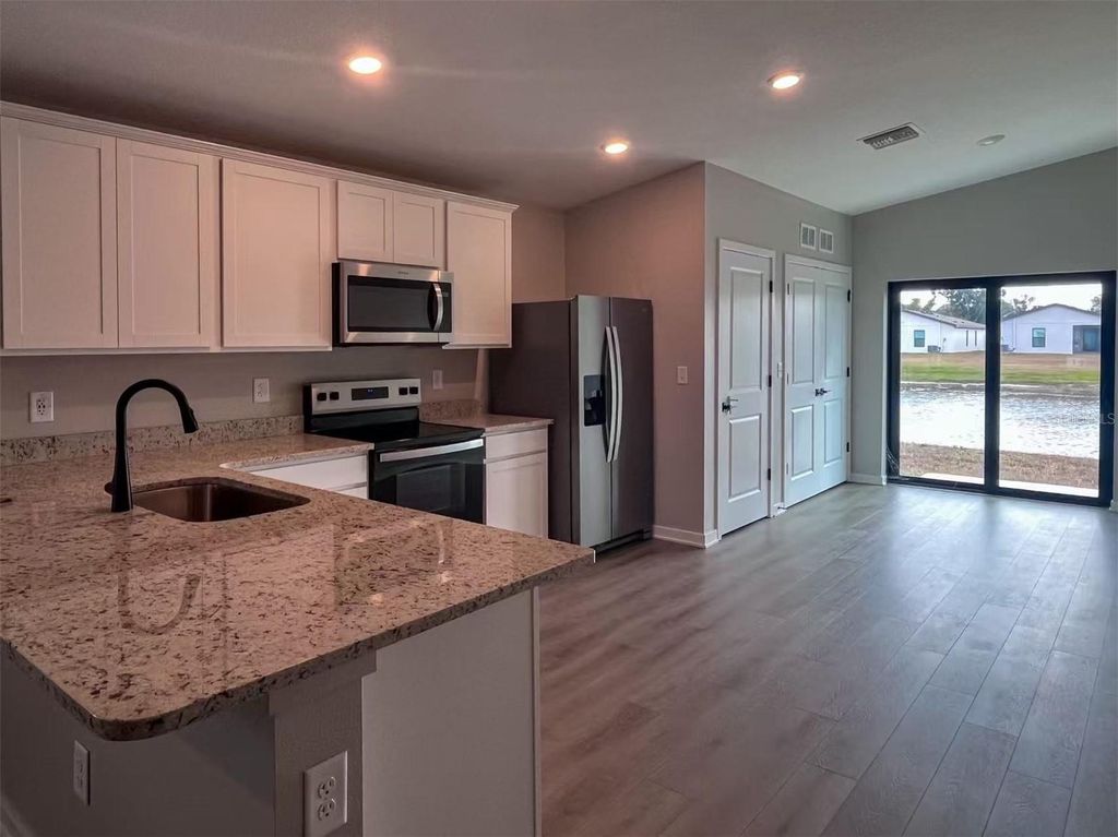 Photo of 5755 Deep River Avenue, Tampa, FL 33619 (MLS # TB8453325)