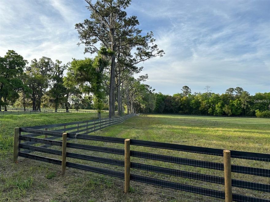 Discover the serene beauty of this 28-acre canvas in the heart of NW Marion County's famed Horse Country. This vacant land offers an idyllic setting for either an elite equestrian estate or a peaceful countryside retreat. Picture yourself galloping through lush, fenced pastures or simply enjoying a quiet afternoon beneath the shade of majestic grand oak trees. With a brand-new fence enclosing the property, it’s ready for your horses, livestock, or grand ideas!

The land features several elevated potential home sites, each providing a stunning panorama, ideal for building your dream home surrounded by picturesque views. Imagine waking up to a pastoral symphony every morning! The property is largely cleared with a charming spot earmarked for a pond, perfect for those who dream of adding a touch of aquatic bliss to their estate.

Practical perks? Check! A new well pump and on-site electricity mean you’re all set to break ground, plant roots, or do both simultaneously. Located on a tranquil road in NW Marion County, just 20 minutes from the World Equestrian Center, this spot offers easy access to top-notch equestrian competitions and state-of-the-art facilities. 

Whether you aim to raise prize-winning horses, enjoy the quiet of the countryside, or explore potential income avenues, this prized plot is your gateway to making those dreams a reality. It’s not just land; it’s a lifestyle waiting to happen. Why wait? Start sketching out those blueprints!