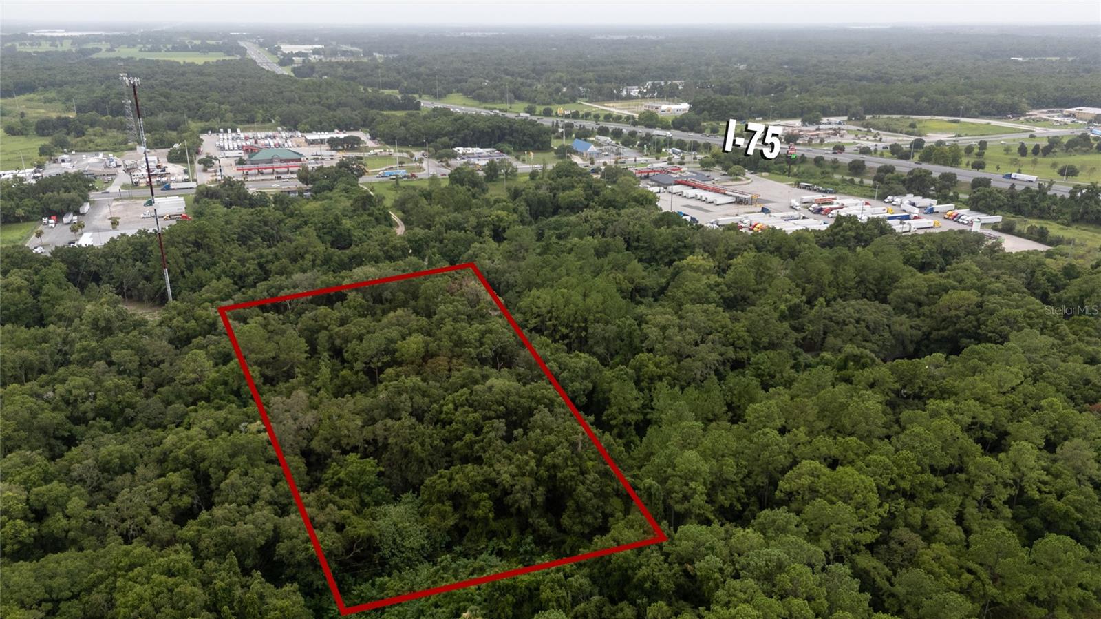 LOCATION!!See this commercial lot in Ocala with a growing consumer market in the area!! just a few minutes from I75 Bring your Commercial Investor in the Area, Perfect for warehouse and Commercial Building! Owner its willing to NEGOCIATE
