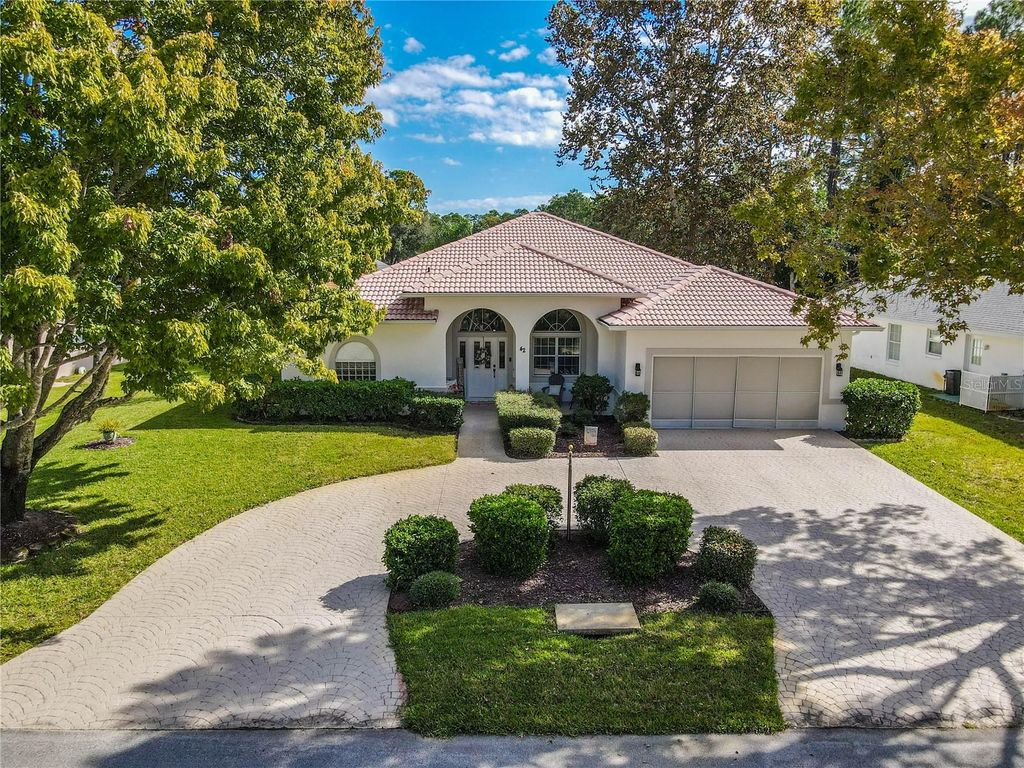 Photo of 42 Woodlyn Lane, Palm Coast, FL 32164 (MLS # FC314806)