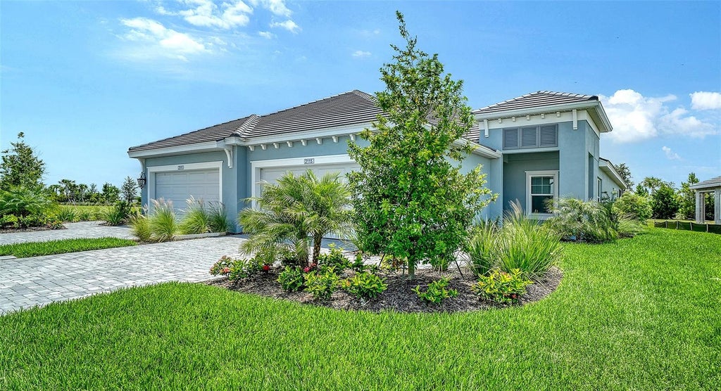 Photo of 2115 Sylvester Palm Lane, Bradenton, FL 34212 (MLS # A4708834)