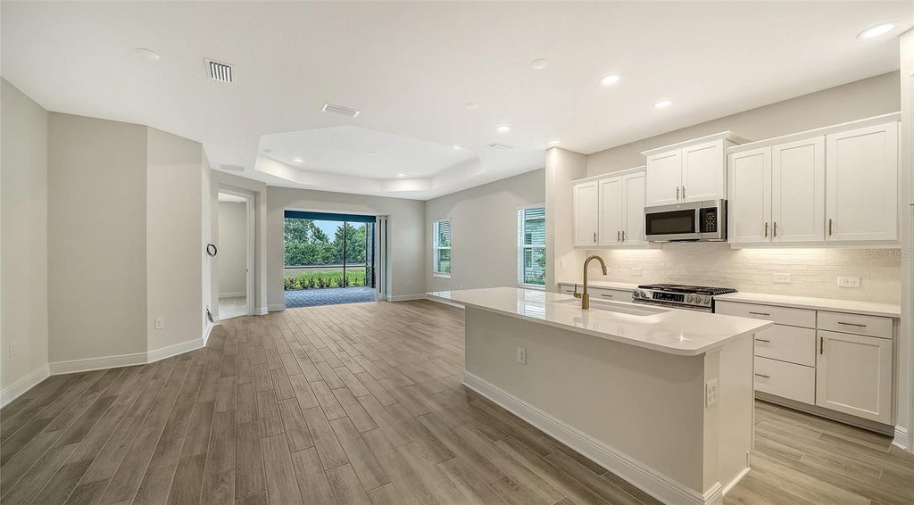 Photo of 2115 Sylvester Palm Lane, Bradenton, FL 34212 (MLS # A4708834)