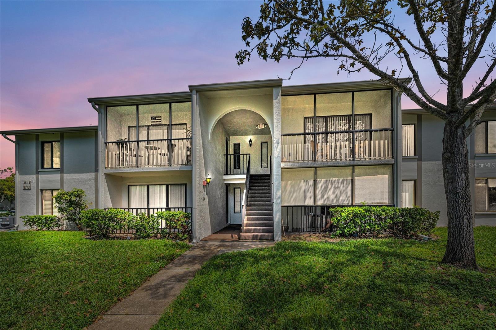 Here it is! Perfect one bedroom condominium on the 2nd floor! Furnished, turnkey and ready to move in as your primary residence, vacation home or investment property. No wait-time to rent as a new owner. Top floor, no neighbors above! Pine Ridge At Palm Harbor is a pet-friendly retirement community! A Newer HVAC system (2023) Hot Water Heater (2021) and Microwave (2025) for your peace of mind. The kitchen has plenty of cabinetry and there's also a hidden slide out storage compartment along the side of the refridgerator. The large primary bedroom includes a walk-in closet. The bathroom has dual access and a full bathtub with shower. 805 sqft. includes the covered and screened patio. Low HOA fees (324.31) include: roof, cable, internet, sewer, trash, water, external pest control, external maintenance, Heated Pool and Spa, Shuffleboard court, Clubhouse, walking trails and an on-site manager. Pine Ridge is a great location near restaurants, shopping, medical and dental facilities, beaches, Honeymoon Island and more! All room dimensions approximate. Call for your in-person or live virtual tour today!