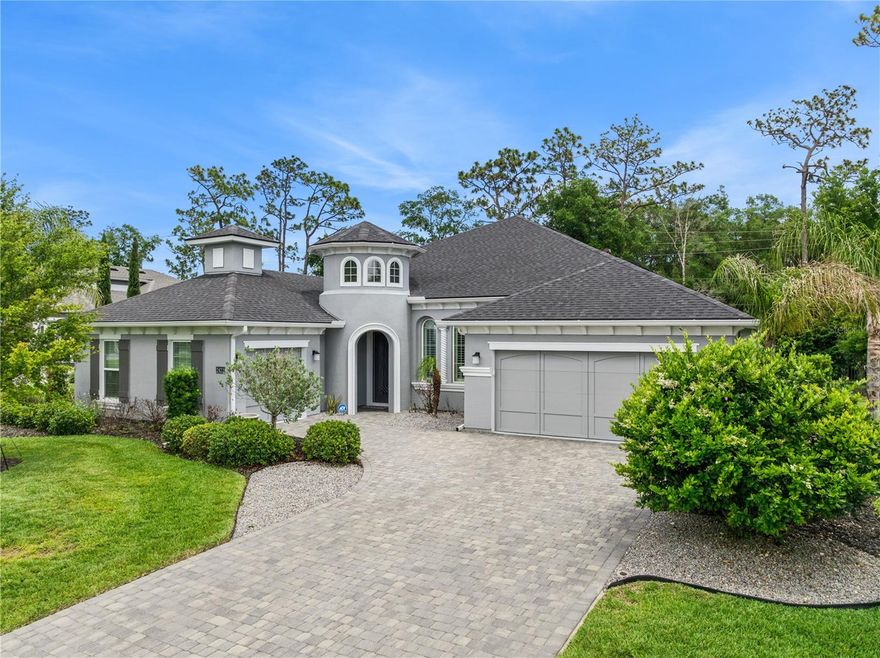 Located in the gated community of Browns Landing in Port Orange, this beautifully designed residence was built in 2021 and offers the perfect blend of modern style, comfort, and functionality. Featuring 4 bedrooms plus a dedicated office, 3 full baths, and an open-concept floor plan, this home is ideal for both everyday living and entertaining.
Step inside to soaring high ceilings, abundant natural light, and a desirable split-bedroom layout that provides privacy for the primary suite. Plantation shutters throughout add timeless style and elegance to every room. The spacious kitchen is the heart of the home, showcasing granite countertops, grey shaker cabinetry, an oversized kitchen island perfect for gathering and hosting, and seamless flow into the living and dining areas.
The oversized primary suite offers a relaxing retreat with a large walk-in closet and a luxurious en suite bath featuring dual split vanities, a soaking tub, and a separate walk-in shower.
Enjoy Florida living year-round from the large screened lanai overlooking the fenced backyard — perfect for outdoor living. Additional highlights include a 3-car split garage, generous storage, and a thoughtfully designed layout throughout.
Conveniently located near I-95, shopping, dining, and everyday conveniences, this move-in ready home combines style, space, and location in one exceptional package.