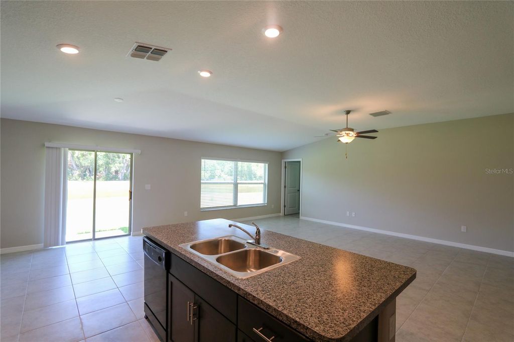 Photo of 7154 Samuel Ivy Drive, Tampa, FL 33619 (MLS # TB8514822)