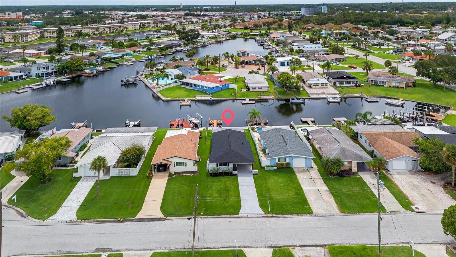 Waterfront Paradise with Gulf Access – Fully Remodeled 3BR/2BA Home + Floating Dock
***COVERING ALL YOUR CLOSING COSTS!!***Welcome to your dream coastal retreat! This beautifully remodeled 3-bedroom, 2-bathroom waterfront home offers the perfect blend of modern elegance and relaxed Florida living. Situated on a serene canal with direct Gulf access, this property features a private floating dock, perfect for boating enthusiasts or sunset lounging.
Step inside to discover a completely updated interior, thoughtfully renovated with meticulous attention to detail. The open-concept layout features stylish finishes, abundant natural light, and seamless indoor-outdoor living. The primary suite offers tranquil water views, while both bathrooms have been beautifully modernized. Plus, an additional outdoor shower adds convenience after a day on the water.
Located in a quiet and well-kept neighborhood, the community offers two private boat ramps exclusively for residents, making it easy to enjoy life on the water. The active Gulf Harbors Civic Association provides a vibrant social atmosphere with clubs for sailing, fishing, cards, social gatherings, and more — there's truly something for everyone.
Residents also have the option to join the Gulf Harbors Private Beach Club, just minutes away. For only $200 annually, enjoy access to a pristine sandy beach with 21 pavilions, charcoal grills, restrooms, and exciting community events year-round.
Conveniently located near top-rated restaurants, shopping, and local attractions, this home offers the perfect blend of privacy, lifestyle, and location.
Don't miss this rare opportunity to live on the water with Gulf access and incredible community amenities. Schedule your private showing today! (Some of the remolding includes, NEW ROOF, NEW WINDOWS, NEW BATHROOMS, NEW KITCHEN, NEW FLOORS, NEW DOCK, NEW LANDSCAPING, NEW PAINT, NEW FIXTURES, AND SO MUCH MORE, OVER 100K IN UPGRADES!)