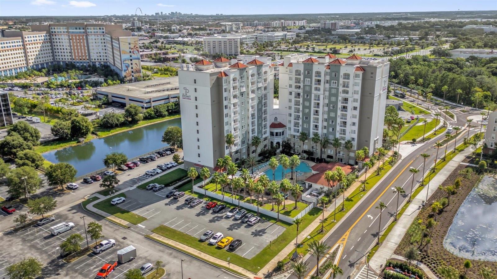 Updated 2-bedroom, 2-bath condo-hotel at The Point Orlando Resort, offering strong investment potential with a rare dual-unit layout. Two independent rentals under one deed: a primary suite with full kitchen and large bath, and a second suite with kitchenette, sofa bed, and bath, ideal as a lock-off. Both units can be rented separately for maximum income or combined for larger groups, providing flexibility for short-term rentals. Features include open living/dining area, balcony, granite counters, wood cabinetry, and in-unit washer/dryer. Resort amenities include pool with bar & grill, fitness center, hot tub, and more. Just 8 minutes from Universal Epic Universe and Universal Studios, ICON Park, International Drive, and the Convention Center, this is a prime two-in-one rental opportunity.