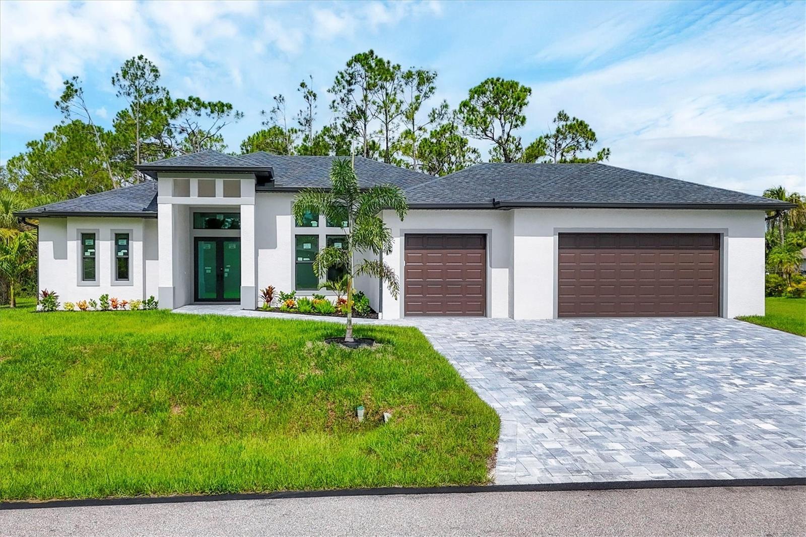 Take a look at this amazing, Brand-new-built home 2025 on almost half an acre of land.NOT FLOOD ZONE! DOUBLE LOT! NO HOA, NO CDD. FULL PRIVACY! GREAT ELEVATION! HIGH CEILING 12-14 FT! 3 CAR GARAGE! LARGE KITCHEN PANTRY! ELECTRIC AVAILABLE FOR POOL HOOK UP! CROWN MOLDING!
This home features a wide open floor plan with all new appliances and completely modernized rooms and bathrooms. This house has 4 bedrooms and 2/5 bathrooms with high ceilings. Situated in a vibrant and thriving community minutes away from Warm Mineral Springs, this property promises a lifestyle filled with abundant sunshine, natural beauty, and coastal charm. Nestled in the heart of NORTH PORT minutes away from WELLEN PARK , this home benefits from its prime location, offering easy access to an array of amenities and attractions. Discover the nearby pristine Gulf beaches, where you can bask in the sun, partake in water activities, or simply relish the tranquility of the ocean. Embark on nautical adventures from the conveniently located marinas, allowing you to explore the region's captivating waterways and nearby islands. Fishing enthusiasts will delight in the world-class fishing opportunities, while golf aficionados can indulge in a variety of renowned golf courses. NORTH PORT is known for its thriving shopping and dining scene, featuring a diverse range of retail centers, boutiques, and restaurants. Immerse yourself in the vibrant downtown area, boasting charming shops, art galleries, and entertainment venues. The city hosts numerous cultural events, festivals, and community gatherings throughout the year, ensuring there's always something exciting happening. Lose yourself in the beauty of Charlotte Harbor Preserve State Park, where scenic trails, wildlife sightings, and peaceful waterways await exploration. Myakka River State Park is another nearby gem, enchanting visitors with its stunning landscapes and diverse flora and fauna. Nature enthusiasts will find endless opportunities to connect with the outdoors just moments away from this property. NORTH PORT also boasts excellent educational institutions, reliable medical facilities, and convenient transportation options. The city's welcoming community and strong sense of belonging make it an ideal place to establish roots and create lasting memories. Do not miss out on this exceptional opportunity to craft your dream home or invest in a prime location. Schedule a showing today and begin envisioning the endless possibilities offered by this remarkable property!