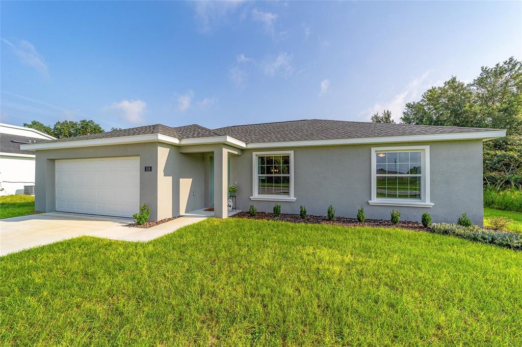 Photo of 648 Marion Oaks Trail, Ocala, FL 34473 (MLS # OM717781)