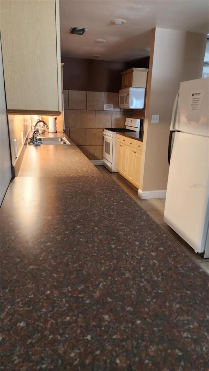 WOODSIDE VILLAGE CONDO - Residential