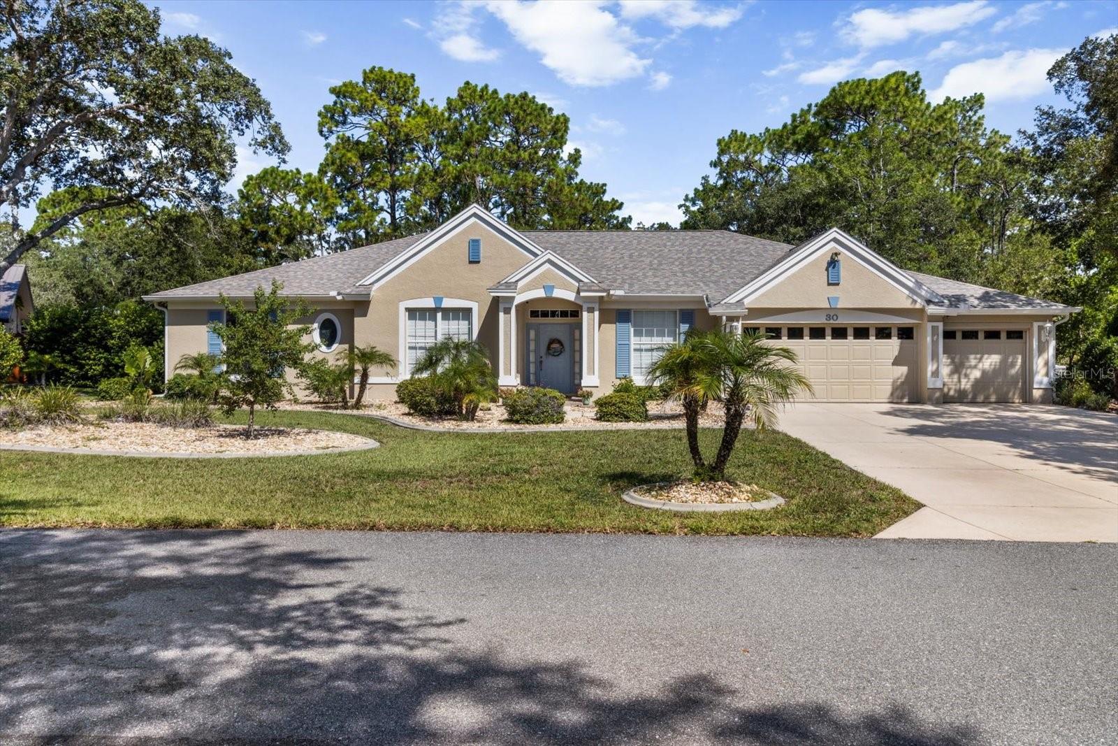 This custom-built POOL home, crafted by a builder known for quality and craftsmanship, offers space, flexibility, and a smart layout suited for large or multi-generational living. With 4 bedrooms, 3 full baths, and a 3-car garage across 2,856 square feet, the home blends comfort and functionality throughout. The split floor plan features a separate guest suite behind a pocket door with two bedrooms and a bath, plus a third ensuite bedroom in addition to the spacious primary suite—providing multiple options for extended family or guests. Recent upgrades include a new roof and gutters (2024), Fresh interior/exterior paint (2025)—giving the home a refreshed, like-new feel. The chef’s kitchen boasts maple cabinetry, granite countertops, a large center island, and newer stainless-steel appliances for family meals or entertaining. The family room impresses with a 17-foot vaulted ceiling, three solar tubes, and a gas fireplace with a 12-foot custom mantle, flanked by built-in bookcases and an entertainment center. The Florida room opens wide to a newly rescreened POOL cage with Phifer 20/20 no-see-um mesh where you'll enjoy your POOL with Diamond Brite finish and a built in automatic cleaning system. All this on a deep greenbelt offering a peaceful outdoor setting. Additional highlights include: California Closets in three bedrooms, 14” Italian tile in main living areas, Hurricane-rated front, side and garage doors, Whole-house water filtration, Extra attic insulation for energy efficiency, Manicured landscaping. With its flexible floor plan, thoughtful upgrades, and inviting indoor-outdoor spaces, this home is move-in ready and built for lasting comfort.