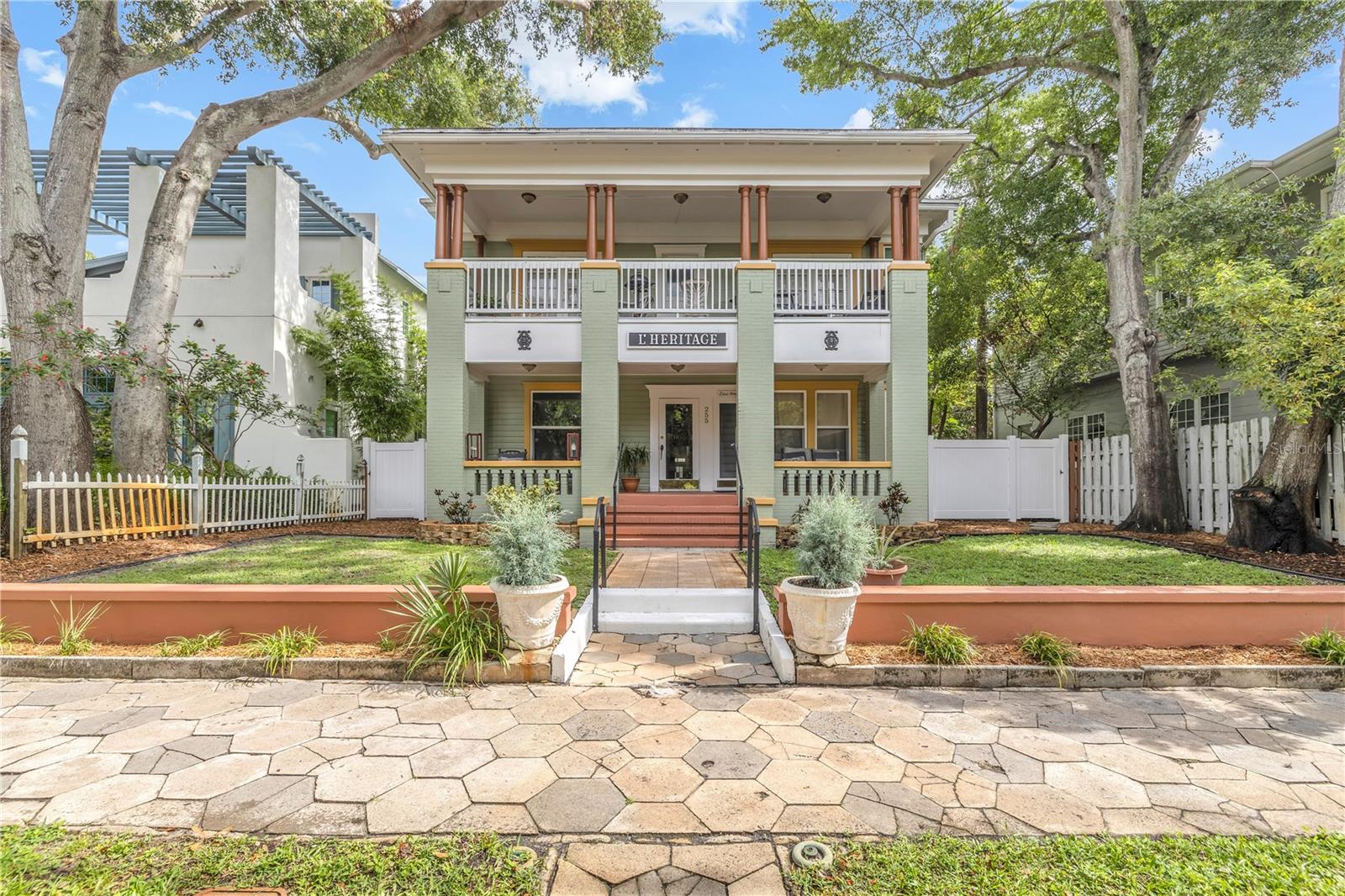 8 UNIT INCOME OPPORTUNITY IN OLD NORTHEAST - ONLY $750K DOWN, OWNER FINANCING AVAILABLE! Located steps away from Beach Dr. NE in vibrant Downtown St.Pete, this 2 Story Multi-Family residence for 5-9 units sits in the iconic and highly demanded neighborhood of Historic "Old Northeast"! Of St. Petersburg’s neighborhoods, the Old Northeast is one of the most sought-after. Nestled next to the water, boasting red brick roads and walking distance of Downtown, living in this neighborhood is a treat! With visible views of The Vinoy Resort, this 1920 Colonial residence of 5,029 sq ft, is a fully leased 8 Unit rental property which includes 2, Two Bedroom/1 Bath, 2, One Bedroom/1 Bath, 3 Studio's and 1 Office along with a detached 2 car garage/workshop/storage/office. This residence as been renovated and restored to its original glory! The original craftsmanship with Heart of Pine Wood flooring and architectural Trimming around doors and Windows as been completely sanded, stained/painted by hand has been preserved and brought back to its original luster. Drywall was completely removed in all units and ALL Electrical has been updated though-out with each unit metered separately as well as the Plumbing and Impact Hurricane Windows! Over time, all units have been updated with NEWER Kitchens/Kitchenettes, NEWER Bathrooms and fresh interior/exterior paint. Each unit has its own outdoor porch or use of the front overhang which surrounded by fresh landscaping with well water irrigation, hexagon walkways, vinyl fencing and 2 entrances with grand stairways to from front to back. This residence does have an onsite coin laundry Washer and Dryer with as well potential tenant storage for additional income. This residence is zoned for Multi-Family Apartments for 5-9 units, however one could look into making it a Single Family home. Residential street parking by permit is available. This is truly one of a kind and with the vibrant urban Downtown Living, Walking, Biking or Running, residents can enjoy Downtown with coffee shops and Restaurants, Museums, the St.Pete Pier, Vinoy Park, Art Galleries, Live events and entertainment galore! St.Petersburg is also known for being a dog friendly city as well. So much to do in this forever growing city surrounded by water. Please DO NOT APPROACH THE PROPERTY as it is occupied by tenants. Schedule a private showing today! Buyer to verify all information.