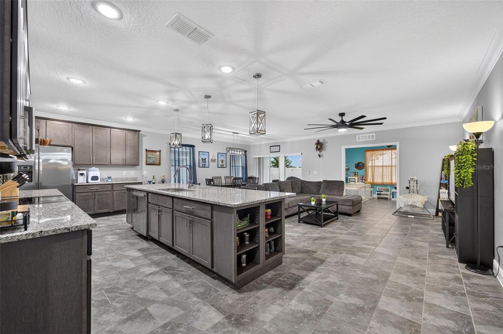 Photo of 414 Taft Drive, Davenport, FL 33837 (MLS # O6447284)
