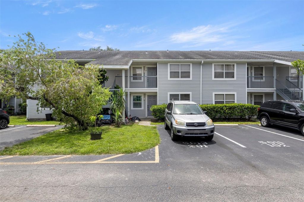 Photo of 5013 Terrace Palms Circle #101, Tampa, FL 33617 (MLS # TB8405483)