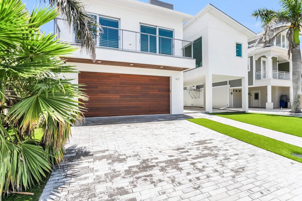 Photo of 905 Bay Point Drive, Madeira Beach, FL 33708 (MLS # TB8396644)