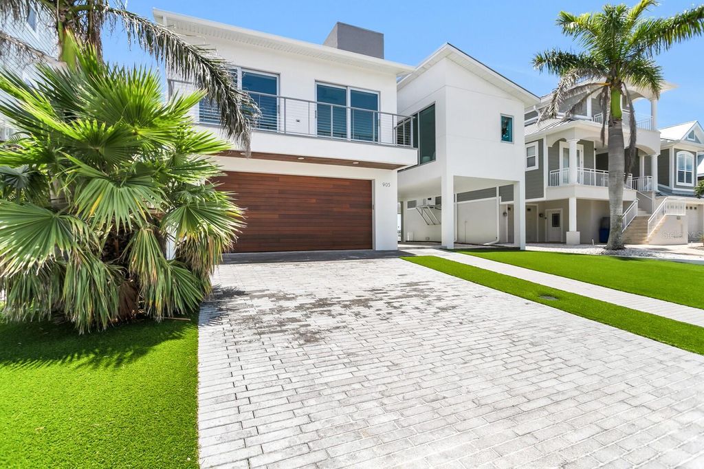 Photo of 905 Bay Point Drive, Madeira Beach, FL 33708 (MLS # TB8396644)