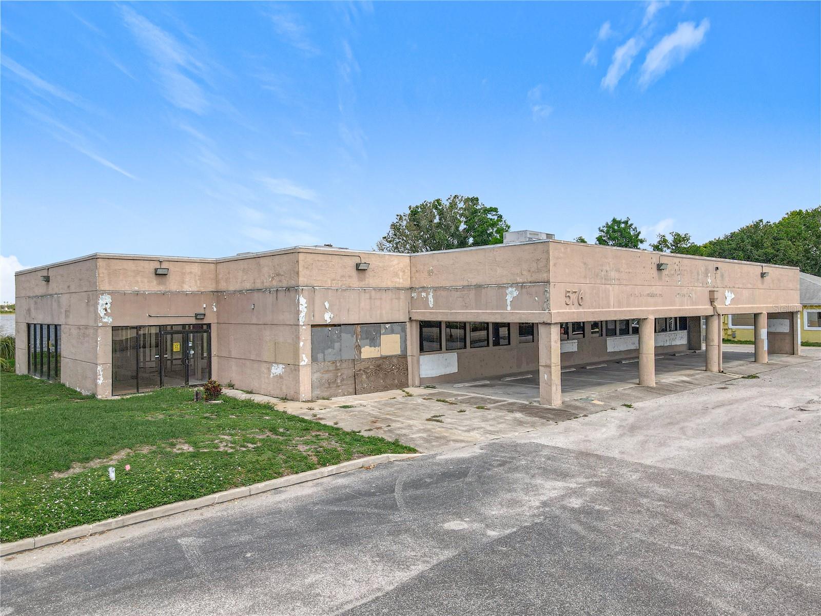 **Prime Lakefront Opportunity – Professional Office Zoning** Unlock the potential of this 6,600 SF lakefront building, ideally located just minutes from the 408, Colonial Drive, and a short drive to the airport. Situated in a high-visibility, easily accessible area, this property offers an excellent opportunity for redevelopment. The structure requires a full renovation, including a new roof, A/C systems, and a complete interior buildout. Zoned for professional office use, it’s a blank canvas ready to be transformed into your vision. Rare lakefront setting adds unique value for office users or investors. Owner financing available. Don’t miss this chance to create something exceptional in a strategic Orlando location.
