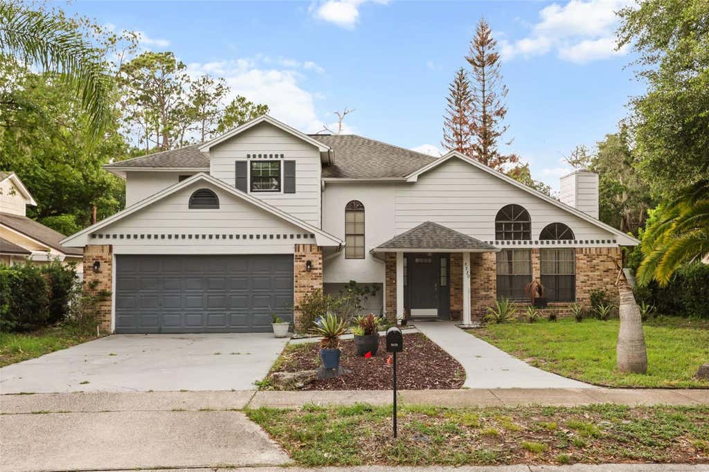 Photo of 5530 S Lake Burkett Lane, Winter Park, FL 32792 (MLS # O6409433)