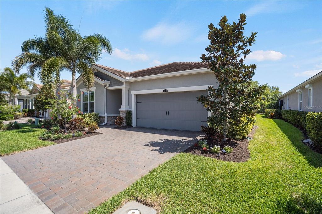 Photo of 5841 Long Shore Loop, Sarasota, FL 34238 (MLS # A4686863)