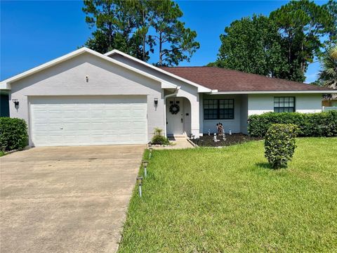 Photo of 6 Willow Grove Place, Palm Coast, FL 32164 (MLS # FC313811)