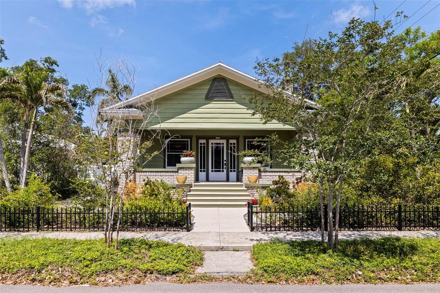 Completely redesigned and beautifully renovated, this charming bungalow seamlessly blends modern luxury with the timeless character of its original design. Located in the highly desirable Euclid St. Paul neighborhood and situated in a coveted Zone X (non-flood zone), this uniquely special property offers exceptional versatility, thoughtful upgrades, and curated living spaces throughout.

The main residence features 3 bedrooms and 2.5 bathrooms, all conveniently situated on a single level. Inside, a bright and refreshed interior showcases a seamless mix of historic charm and contemporary enhancements, highlighted by 10-foot ceilings throughout and original hand-plastered molding in the main living areas, preserving the home’s architectural integrity. Restored original windows, newly installed flooring details, and a reimagined layout—including an opened kitchen wall—create a more fluid, connected living space. The chef’s kitchen is anchored by a premium Thermador gas cooktop with a GE Monogram hood, complemented by new appliances including a refrigerator, dishwasher, and a 2025 washer and dryer.

Comfort and efficiency have been carefully considered with a high-efficiency HVAC system, tankless water heater, water softener/RevOS system, and integrated home theater wiring with in-ceiling speakers for an elevated entertainment experience. Custom closet organizers add function and sophistication, while the remodeled bathrooms feature designer finishes, including rainhead showers with handheld fixtures and updated tile work.

A rare stand-up attic with stair access presents an incredible opportunity for future expansion—ideal for additional living space, a home office, or a creative retreat.

Adding even more value and flexibility, the property includes a fully remodeled detached two-car garage with a beautifully updated 1-bedroom, 1-bath accessory dwelling unit (ADU). The garage apartment features all new windows and modern finishes, making it perfect for guests, rental income, or multigenerational living. The downstairs garage space has also been fully renovated, offering additional functionality and storage.

Outdoor living is just as impressive, with newly installed fencing (2025), fresh parking and patio pavers, a new composite wood deck, and a thoughtfully designed entertaining area complete with a gas fire pit and outdoor sink. A newly added well and irrigation system enhances the landscaping, while the front porch has been opened back to its original design—bringing back the classic bungalow charm and creating a welcoming first impression.

With new roofs, extensive system upgrades, and meticulous attention to detail throughout, this home offers peace of mind alongside its undeniable style.

Situated in one of St. Petersburg’s most sought-after neighborhoods, this home delivers the perfect balance of historic character and modern convenience, just moments from downtown, local parks, and the vibrant dining and shopping scene