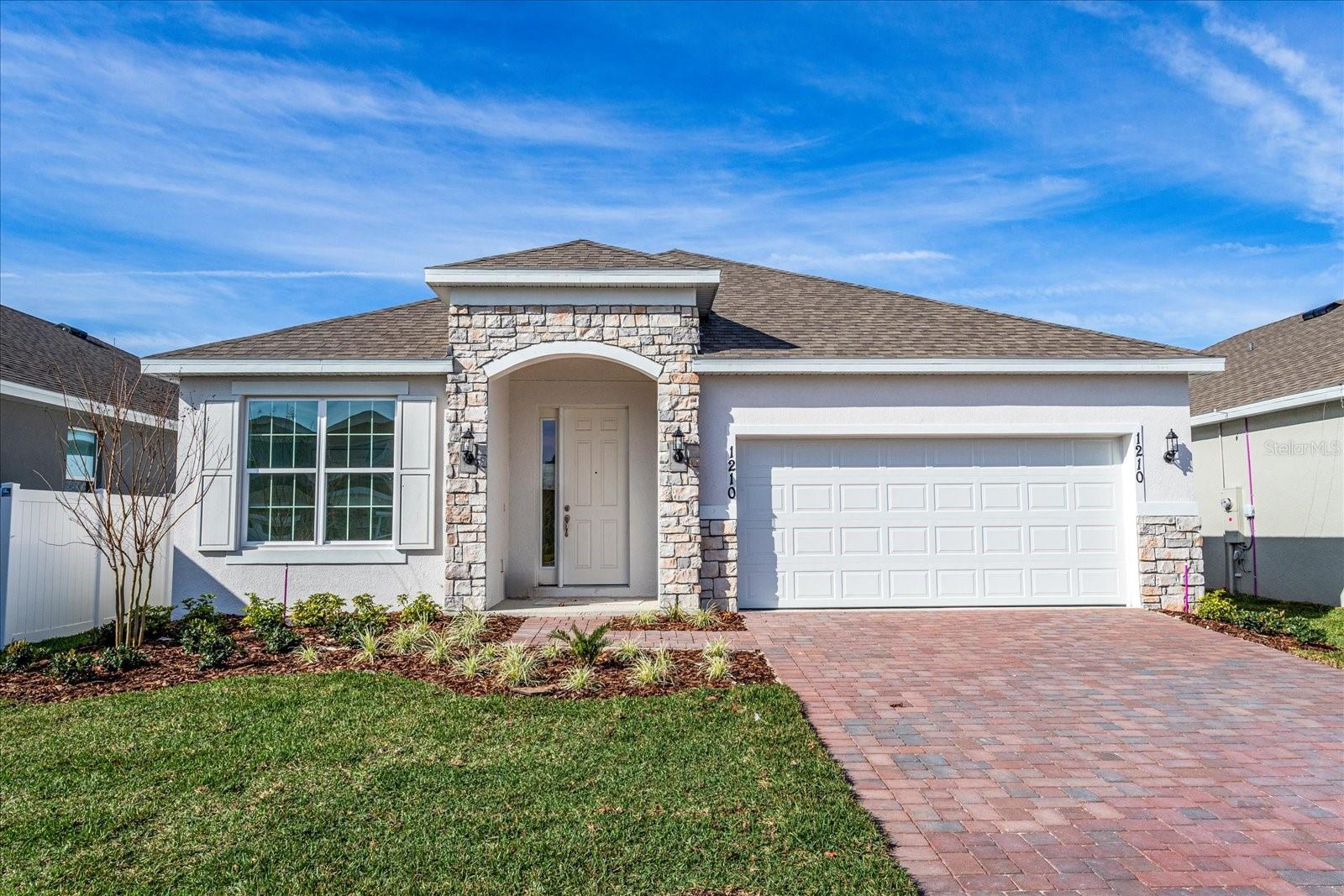 One or more photo(s) has been virtually staged. MODEL LEASEBACK 7% Triple Net Lease Beautifully designed open floor plan POINCIANA MODEL perfect for modern living and
entertaining. Boasting 4 spacious bedrooms and 2 full bathrooms, this home also includes a versatile flex space—ideal for a home office,
playroom, or formal dining area to suit your lifestyle. The gourmet kitchen is a chef’s dream, complete with sleek quartz countertops, 42-inch
cabinetry, and ample prep space for hosting or everyday meals. Retreat to the luxurious master suite, offering two oversized walk-in closets and a
spa-inspired walk-in shower for ultimate comfort and convenience.