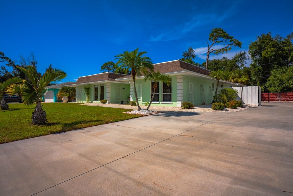 Photo of 2339 Riverwood Pines Drive, Sarasota, FL 34231 (MLS # A4707250)