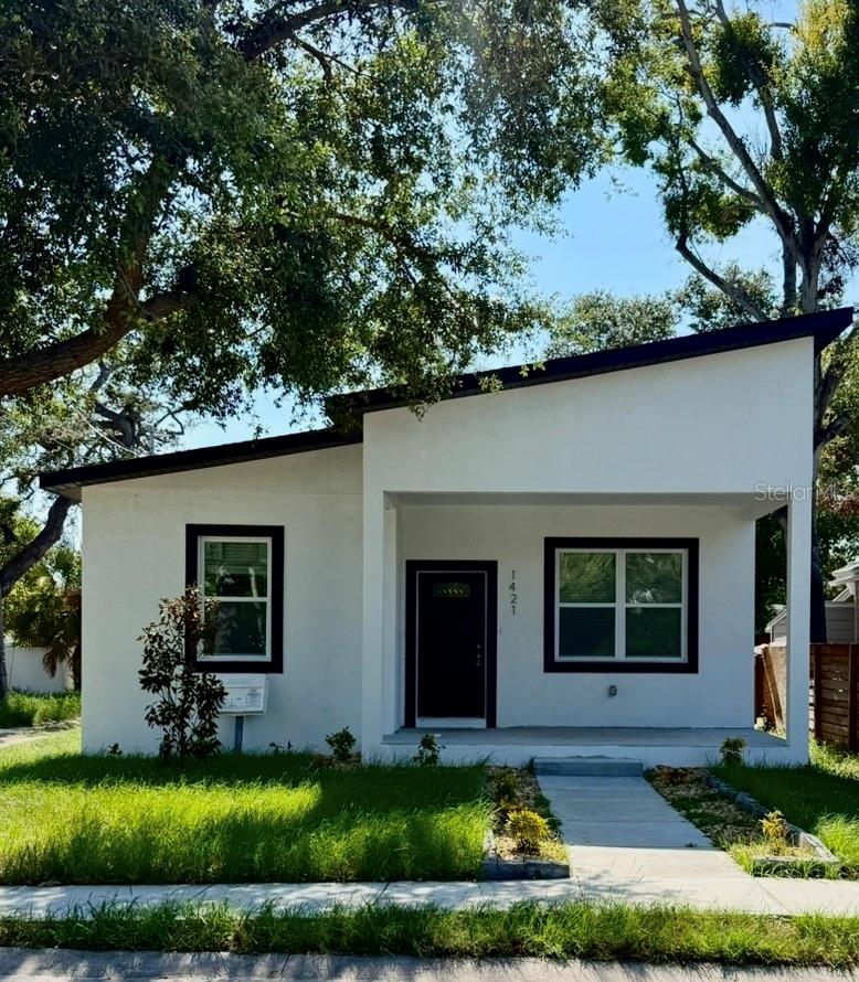 EXCEPTIONAL INCOME OPPORTUNITY OR FLEXIBLE LIVING SPACE. This new construction home offers a spacious 3-bedroom, 2-bathroom primary residence alongside a detached 1-bedroom, 1-bathroom accessory dwelling unit (ADU). It's ideal for rental income, multigenerational living, a home office or guest house. The MAIN HOME is approximately 1,350 sq. ft. featuring soaring ceilings, vinyl plank and tile flooring throughout, and luxurious kitchen, with granite countertops and stainless-steel appliances. The master suite has a beautiful walk-in shower. There are in-unit laundry connections for your added convenience. The ADU offers its own entrance, kitchen, bathroom, and living area. It's approximately 550 sq. ft. of stylish living space, also showcasing high ceilings, vinyl and tile flooring, a full kitchen and in-unit laundry connections. These homes are constructed with durable block construction. Both units energy-efficient upgrades throughout.