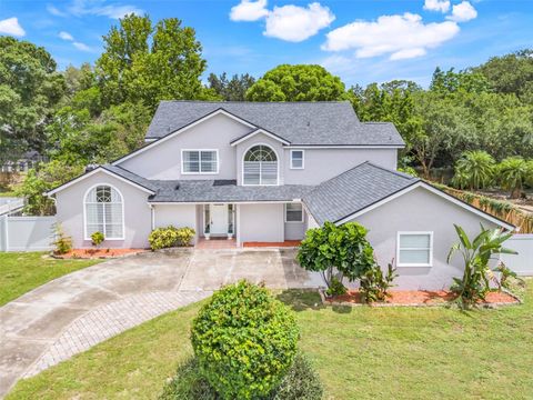 Photo of 7938 Tumblestone Drive, Orlando, FL 32819 (MLS # G5099456)