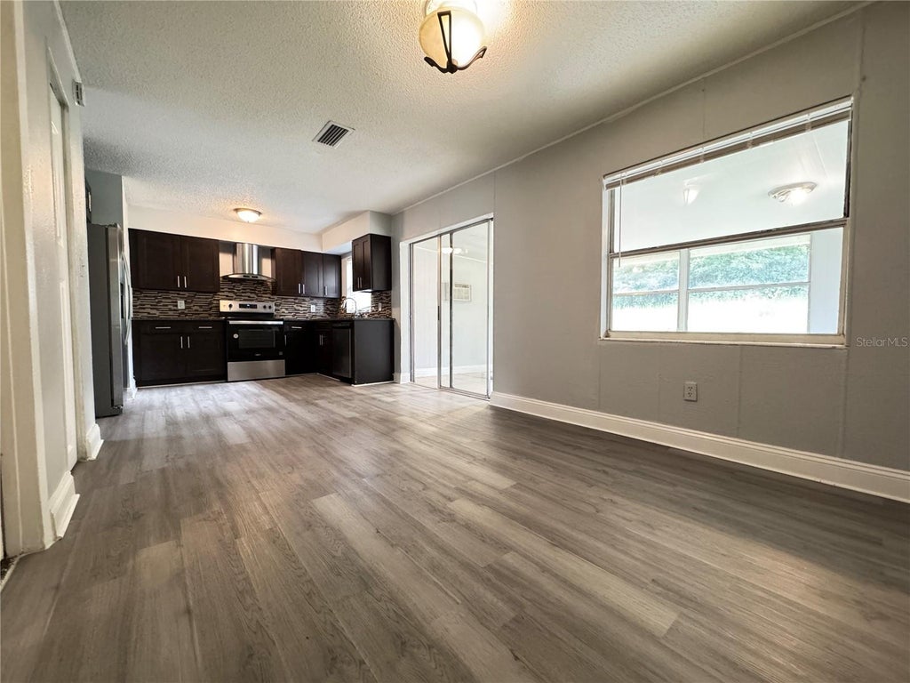 Photo of 3308 Dragoon Place, Orlando, FL 32818 (MLS # O6441579)