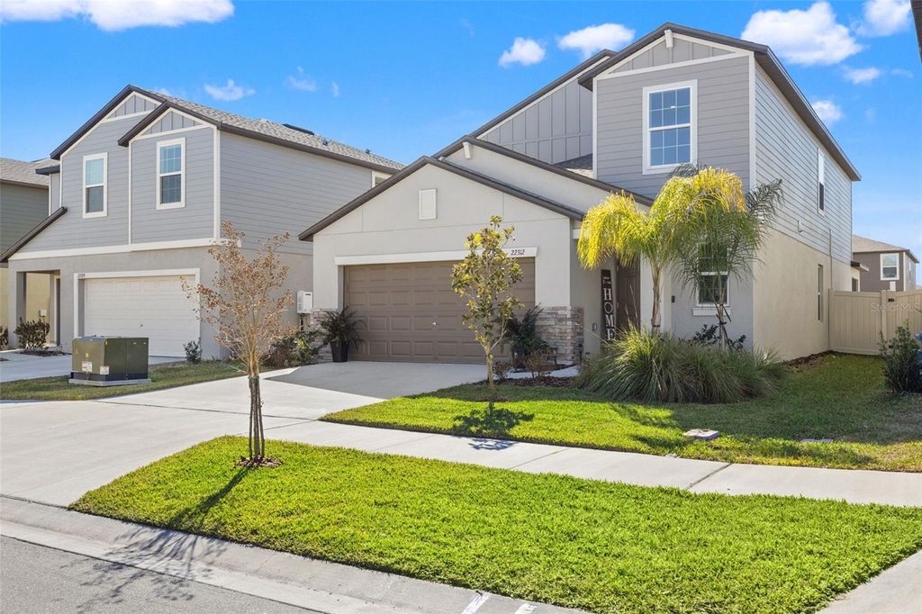 Photo of 22312 Pleasant Morning Drive, Land O Lakes, FL 34637 (MLS # TB8474000)