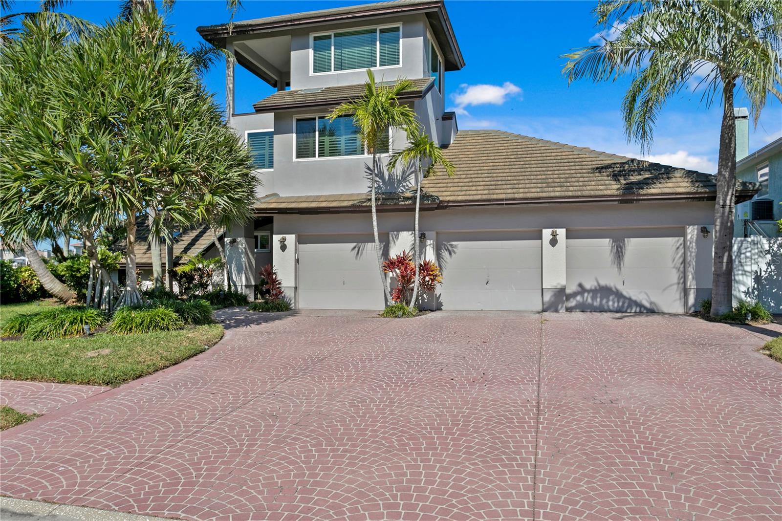 Incredible NEVER FLOODED 4 bedroom, WATERFRONT home in the highly desirable gated community of Pasadena Yacht and Country. This fiercely protected open concept home never got water in the pool! Your new home boasts a grandfathered in covered boathouse with a composite dock to include two lifts or one large enough for a 60ft boat, patio awning with a misting system for hot days, roof covered with warranty, impact doors/windows, hurricane shutters, newer AC’s and water heater, climate moderated jet ski/storage room, bonus room/gym etc.
This 4 bedroom, 3 bath, 3 car garage home just survived 3 storms with ZERO flooding. Buying this home today secures you a chance to jump the waitlist on the highly coveted membership to Pasadena Yacht and Country Club.