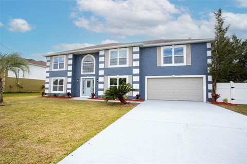 Photo of 73 London Drive, Palm Coast, FL 32137 (MLS # O6284859)