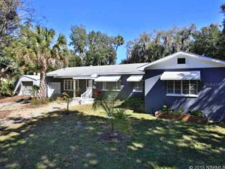 CHARMING & SPACIOUS 3 BED/2 BATH HOME NEAR HISTORIC DOWNTOWN- Impeccably maintained home settled in the highly desirable area of Historic Downtown & Canal St. Gorgeous original hardwood floors throughout, charmingly remodeled & updated kitchen & bathrooms offer all the comfort of modern conveniences. Behind glass French doors there is a bonus room providing flexible space perfect for an office, playroom, studio, etc.! Massive oversized lot with a huge fenced backyard boasting fruit trees & mature oak trees.  The home features a 1 car garage PLUS huge full power workshop/storage space/additional garage space.  Nearby Canal St. area has a lot to offer; restaurants, shopping, specialty stores, offices & more! Additionally, throughout the year canal street plays host to all sorts of events such as a weekly farmers market, art walks, car shows, home & business expo, fishing tournaments & more. Minutes to the beach, and easy access to US1, I-95 & I-4. This property has everything to offer plus room to grow! ;Water: City