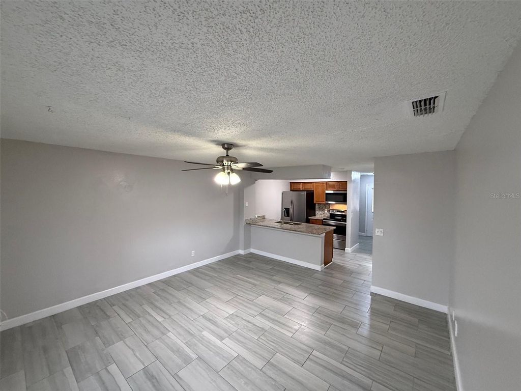 Photo of 6130 Oak Cluster Circle, Tampa, FL 33634 (MLS # TB8481537)