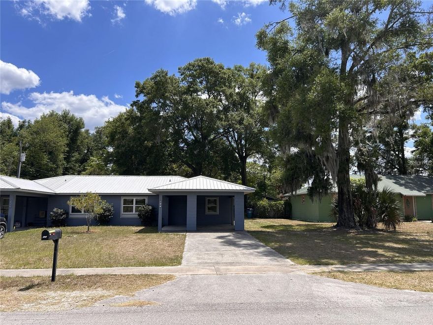 Duplex with a great yard, all hard surface flooring and a Florida room.  Light and bright with no carpet for easy maintenance, yard maintenance is included.