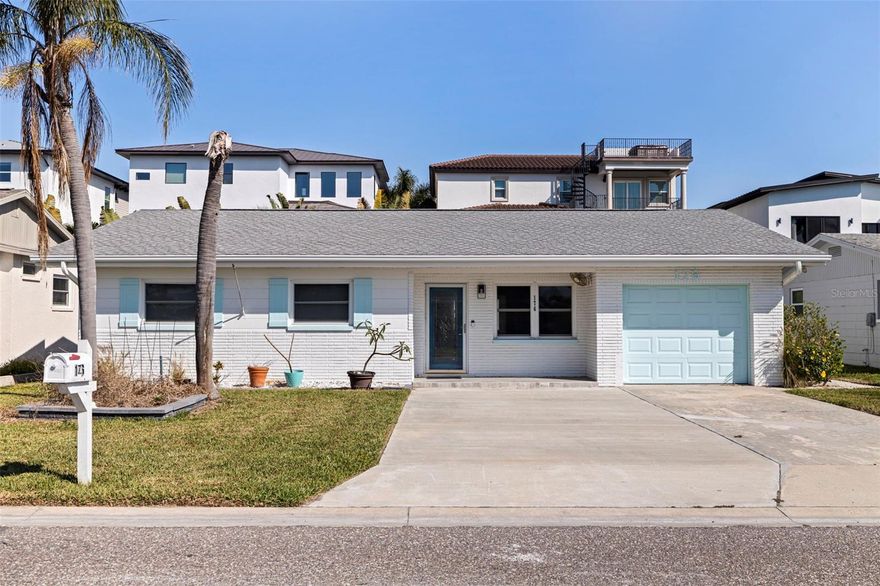 Welcome to your ideal coastal retreat in Redington Shores where modern updates meet effortless beach living. This beautifully renovated three-bedroom, two-bath home offers a bright, open floor plan designed for relaxing and entertaining. The thoughtfully updated interior flows seamlessly from the living space to the kitchen, creating an inviting atmosphere ideal for everyday living or hosting guests. With three bedrooms, plus the Florida room, you have plenty of space to host. Just three blocks from Gulf Boulevard, you'll enjoy easy access to local restaurants, entertainment and public beach access leading to the stunning Gulf waters. Spend your days soaking up the sun, then return home to unwind in your private, generously sized backyard ideal for gatherings, grilling or simply enjoying the coastal breeze. With its fresh renovations and low-maintenance design, this home is completely move-in ready and the ideal full-time residence, vacation getaway or investment opportunity offering the best of beach living without the hassle.