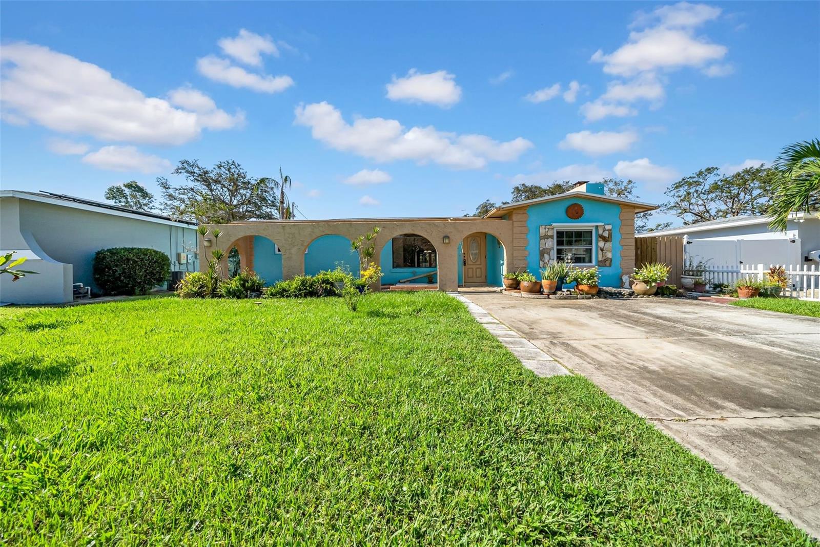 Welcome to your new home in the highly desired Disston Heights neighborhood of St. Petersburg! This solid block construction, 3 bedroom, 2 bathroom POOL HOME sits high and dry in the heart of the city. Just under 2,000 sqft! This home has a split floor plan layout, a cozy wood-burning fireplace, and peace of mind with big ticket items updated. Upon entering through the front door, there is a seamless flow and open sightline from the living room through the dining area, bonus room, through the glass French doors and the large covered screened porch all the way to the sparkling pool. The primary bedroom has it's own private en suite bathroom with separate makeup area and a walk-in closet
Outside, the property boasts a sparkling pool, a relaxing screened-in porch, a detached garage, a long driveway with plenty of parking, and convenient alley access. Ideally located just 15 minutes to the world-famous beaches and 10 minutes to vibrant Downtown St. Pete!
With plenty of space for entertaining and everyday living, this home truly combines comfort, functionality, and charm. (ROOF 2014, HVAC 2022, W/H 2025,WINDOWS 2024)