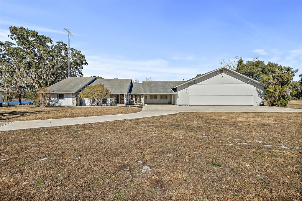 Photo of 127 Eagles Nest Lane, Crescent City, FL 32112 (MLS # FC316061)