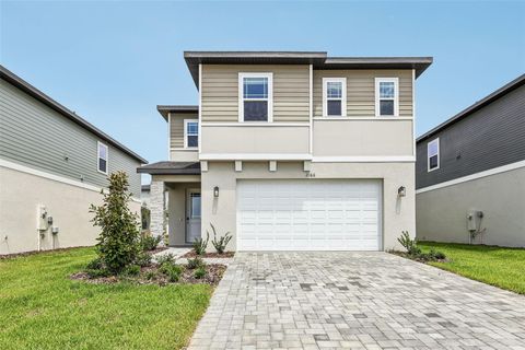 Photo of 2166 Wildberry Way, Minneola, FL 34715 (MLS # TB8487395)