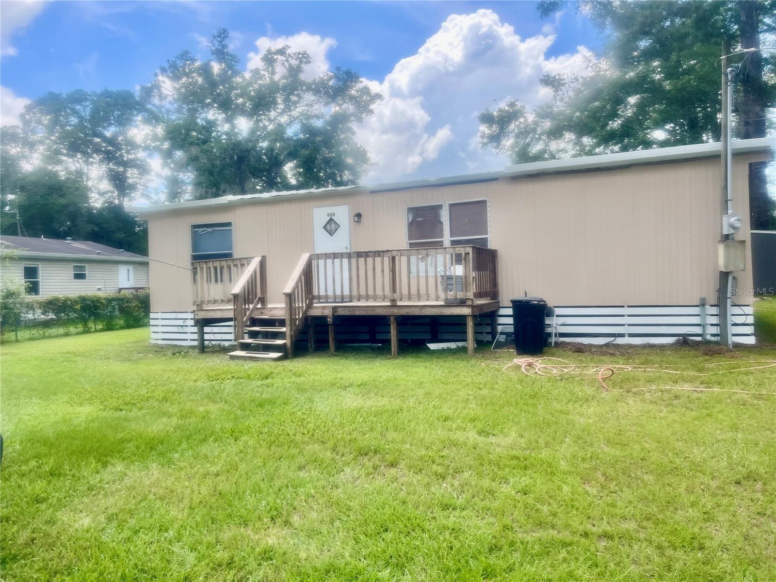 Great Investment Opportunity – Just 4 Minutes from the World Equestrian Center!
Welcome to this income-producing mobile home located in a growing area with no HOA fees. This turnkey property is currently leased through February 28, 2023, offering a great opportunity for investors looking for immediate rental income with minimal overhead.
The home features an updated kitchen. Fenced .25 acres yard offers space for pets, a garden, or even a future pool. There’s also ample parking for vehicles, RVs, or work equipment—perfect for tenants with multiple needs.
Situated in a modest yet accessible community, this property provides excellent proximity to Ocala’s World Equestrian Center, making it attractive to tenants working in the area.
Don’t miss this chance to add a solid income property to your portfolio. Schedule your showing today!
