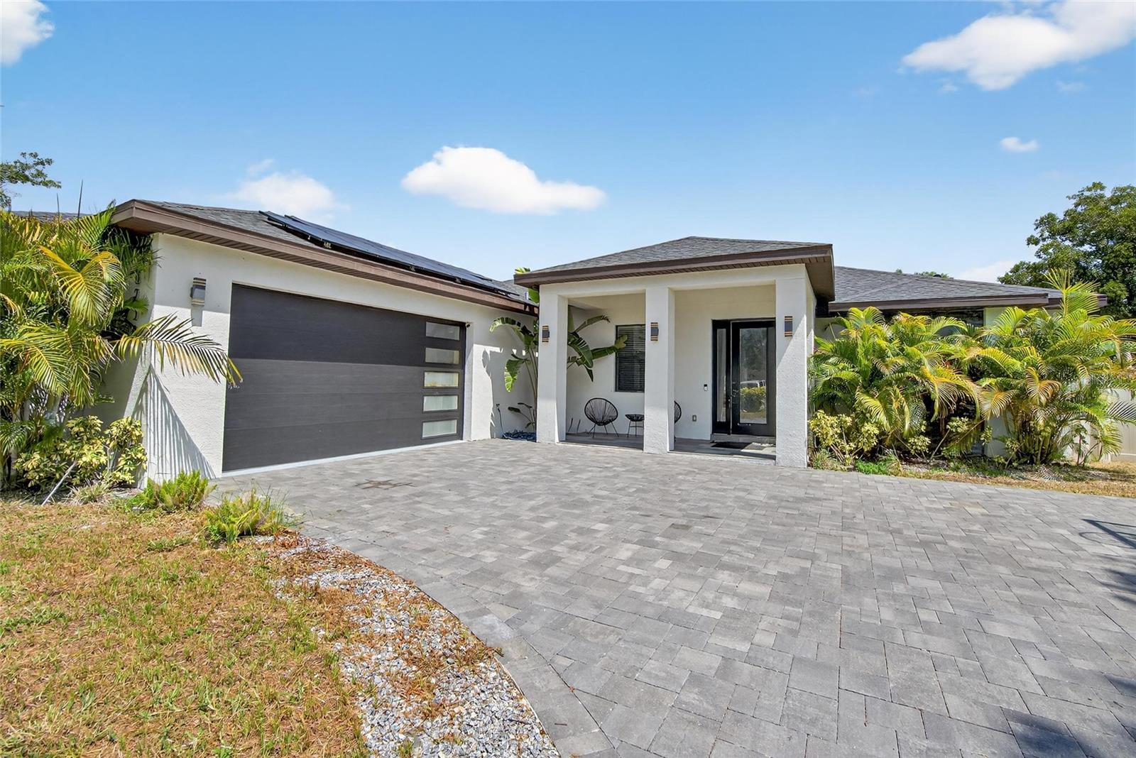 Welcome to 8256 Malvern Circle, a beautifully updated 4-bedroom, 3-bathroom home in the heart of Tampa. Featuring modern finishes and tile flooring throughout, this spacious residence offers an open-concept layout filled with natural light. The large backyard is perfect for entertaining or relaxing, while the prime location puts you just minutes from grocery stores, shopping centers, International Plaza, and only 10 minutes from Tampa International Airport. With a motivated seller, this stylish and centrally located home is a must-see! Whether you're a first-time buyer or looking to upgrade, this property offers the perfect blend of comfort and convenience. Enjoy peace of mind with move-in ready condition and flexible living space for families or guests. Don’t miss your chance to own a home that truly checks all the boxes.