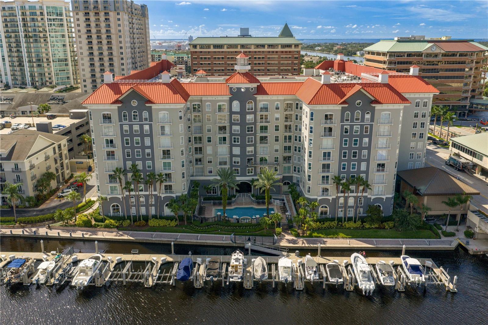 Nestled in the heart of vibrant Harbour Island, this stunning 3 bedroom, 2 bathroom single-level condo located on the 2nd floor is a masterpiece of modern elegance and sophisticated comfort. Completely reimagined from top to bottom, this split floor plan residence exudes luxury and functionality, offering a seamless blend of style and convenience in one of Tampa’s most coveted locations. Step inside to discover a bright and airy interior, freshly painted and adorned with sleek new luxury vinyl flooring that flows effortlessly throughout the open living spaces. Plush new carpeting adds warmth to the bedrooms creating inviting retreats for rest and relaxation. The gourmet kitchen is a chef’s dream, featuring exquisite marble countertops that elevate every culinary experience, complemented by newer stainless steel appliances and contemporary design. Updates include Brand New HVAC, new paint throughout, both bathrooms have been meticulously updated with modern fixtures that cast a welcome glow and finishes offering spa like serenity for your daily unwind. Every detail has been thoughtfully curated to create a space that feels both timeless and on-trend. Located in the heart of Harbour Island, this condo places you just moments away from Tampa’s finest dining, shopping, entertainment, and waterfront attractions. Whether you’re strolling along the scenic Riverwalk, or enjoying the nightlife of Waterstreet Downtown, this prime location offers unparalleled access to to everything that makes Tampa extraordinary. Don’t miss your chance to own a piece of Tampa’s most desirable address. Schedule your private showing today and experience the allure of this breathtaking condo for yourself. Located in A+ Rated schools; Plant High School, Wilson Middle School and Gorrie Elementary.